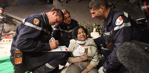 Dr. Chand after being pulled from the rubble.